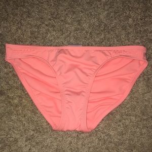 Neon orange swim bottoms